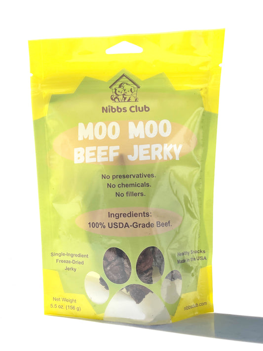 Moo Moo Beef Jerky dog treat in green and yellow packaging on a white background